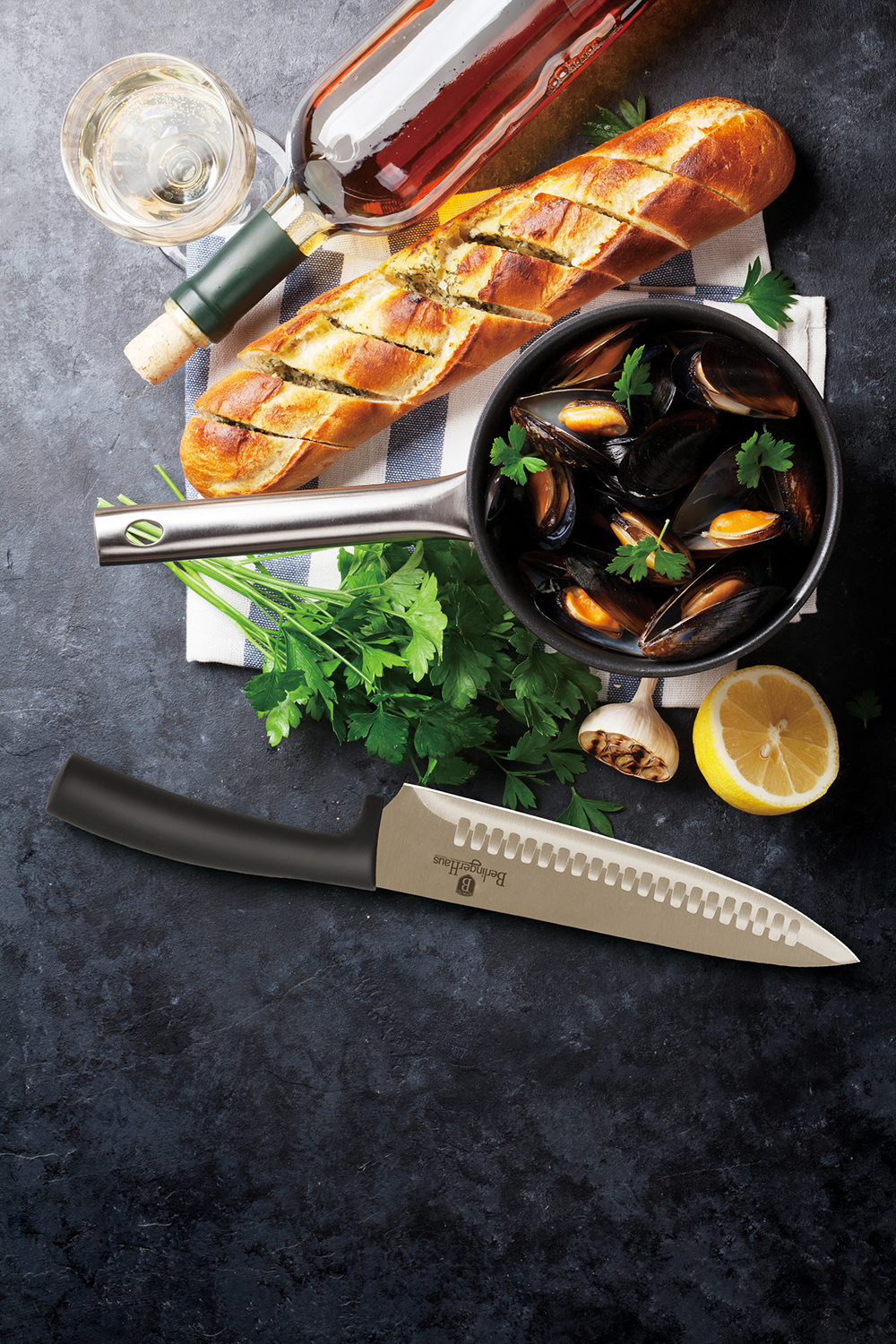 Mussels in copper pot and white wine on stone table. Top view wi