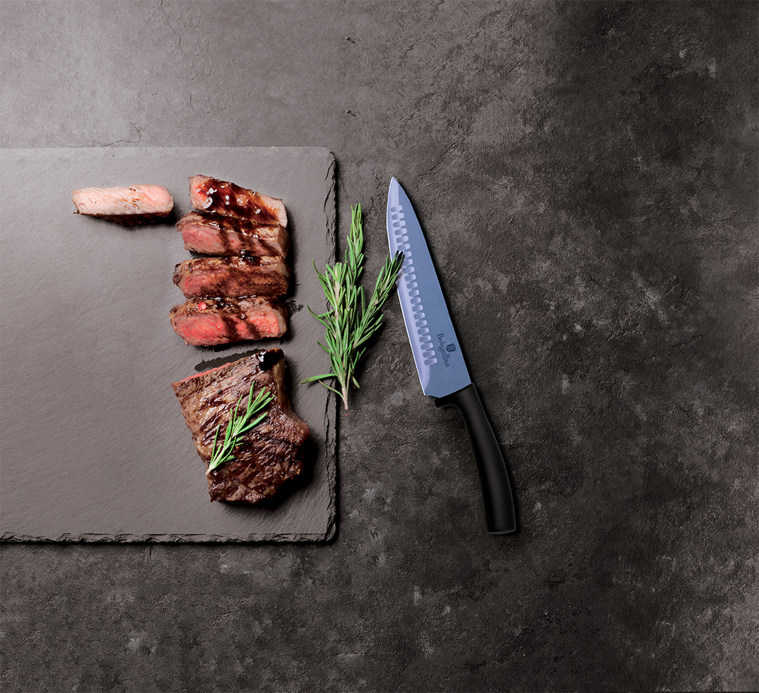 Grilled sliced beef steak with balsamico and rosemary on stone t