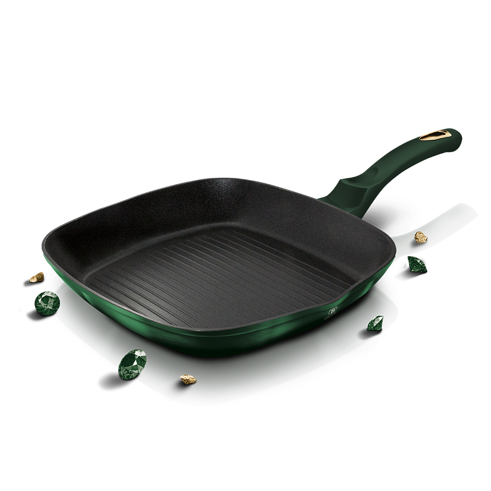 Partially Covered Copper Cooking Pot Between Garlic And Carving