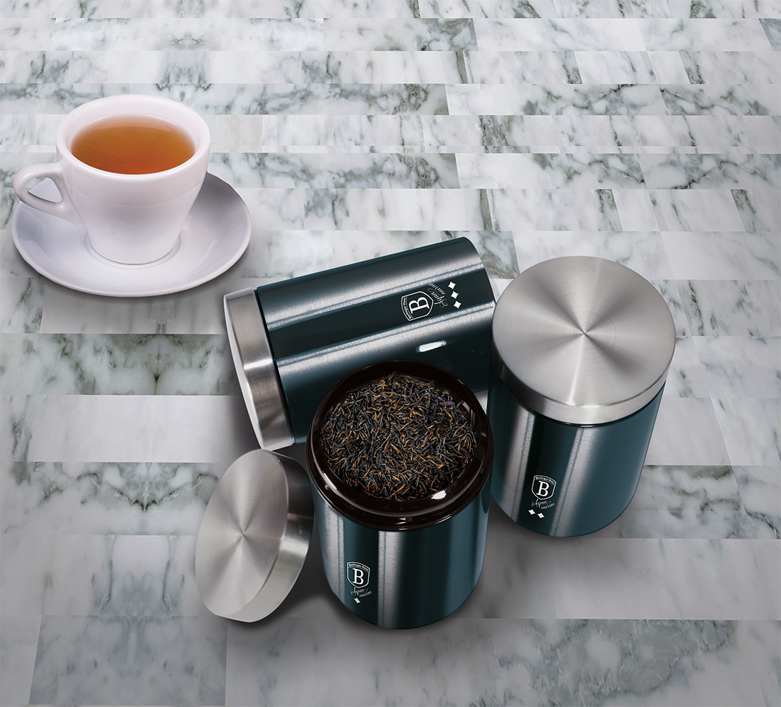 Assortment of dry flower tea and honey over black slate stone with copy space